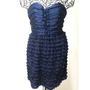 Strapless navy dress with ruffle skirt